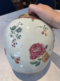 A pair of fine Chinese famille rose 'botanical Merian-style' jars with wooden covers, Qianlong
