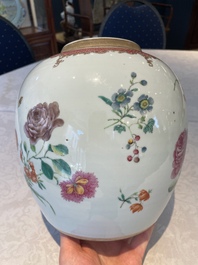 A pair of fine Chinese famille rose 'botanical Merian-style' jars with wooden covers, Qianlong