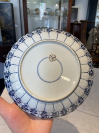 A group of thirteen Chinese blue, white and famille rose plates and a bowl, late Ming/early Qing