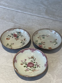 Two Chinese famille rose teapots, ten cups and nine saucers, Qianlong