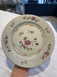 A collection of 22 Chinese famille rose and Imari-style plates, 18th C.