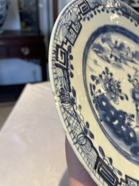 A group of thirteen Chinese blue, white and famille rose plates and a bowl, late Ming/early Qing