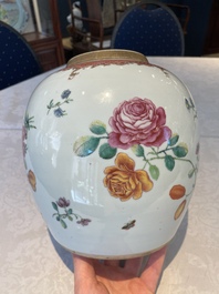A pair of fine Chinese famille rose 'botanical Merian-style' jars with wooden covers, Qianlong