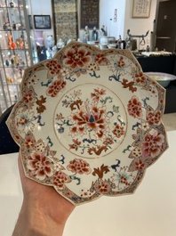 A Chinese famille rose lotus-shaped dish and two plates, Qianlong