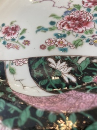 A pair of Chinese famille rose black-ground 'flowers and scrolls' plates, Yongzheng/Qianlong