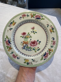 A collection of 22 Chinese famille rose and Imari-style plates, 18th C.