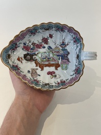 A Chinese famille rose black-ground teapot with cover and stand and a sauce boat, Qianlong