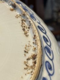 A group of thirteen Chinese blue, white and famille rose plates and a bowl, late Ming/early Qing