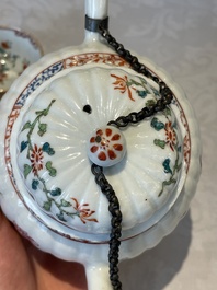 Two Chinese famille rose teapots, ten cups and nine saucers, Qianlong