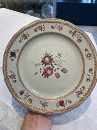 A collection of 22 Chinese famille rose and Imari-style plates, 18th C.