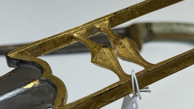 A collection of three daggers decorated with jade, silver and gold and an Indian mogul sword, India, 17/19th C.