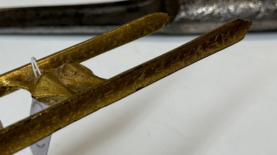 A collection of three daggers decorated with jade, silver and gold and an Indian mogul sword, India, 17/19th C.