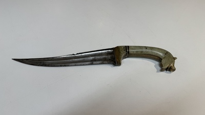 A collection of three daggers decorated with jade, silver and gold and an Indian mogul sword, India, 17/19th C.
