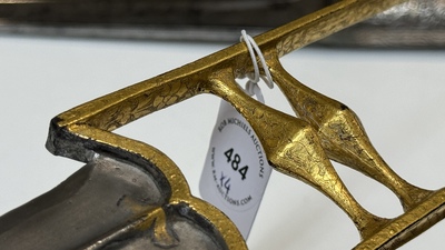A collection of three daggers decorated with jade, silver and gold and an Indian mogul sword, India, 17/19th C.