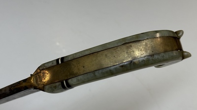 A collection of three daggers decorated with jade, silver and gold and an Indian mogul sword, India, 17/19th C.