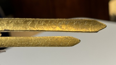 A collection of three daggers decorated with jade, silver and gold and an Indian mogul sword, India, 17/19th C.