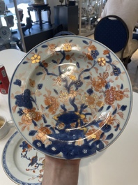 A varied collection of thirteen Chinese blue and white, Imari-style, famille rose and famille verte plates, Kangxi/Qianlong