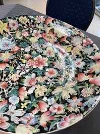 A Chinese famille rose 'mille fleur' dish, a famille verte plate and a pair of famille rose plates, Qianlong mark, 19/20th C.
