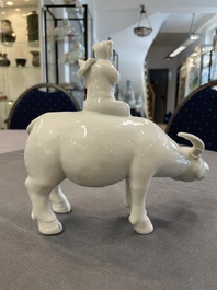 A Chinese blue and white garlic-mouth vase and a white glazed group of a boy on a buffalo, Wanli/Qianlong