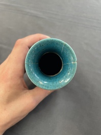 Three Chinese monochrome turquoise-glazed vases with two wooden stands, Kangxi and later