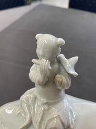 A Chinese blue and white garlic-mouth vase and a white glazed group of a boy on a buffalo, Wanli/Qianlong