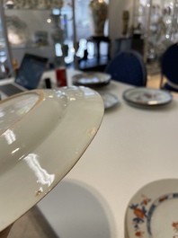 A varied collection of thirteen Chinese blue and white, Imari-style, famille rose and famille verte plates, Kangxi/Qianlong