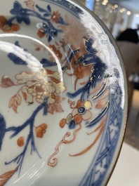 A varied collection of thirteen Chinese blue and white, Imari-style, famille rose and famille verte plates, Kangxi/Qianlong