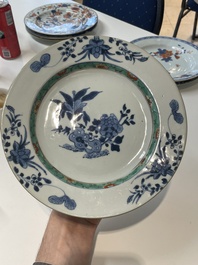 A varied collection of thirteen Chinese blue and white, Imari-style, famille rose and famille verte plates, Kangxi/Qianlong