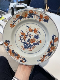 A collection of eleven Chinese Imari-style plates with floral design, 18th C.