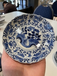A varied collection of Chinese blue and white, grisaille and famille verte porcelain, Kangxi and later