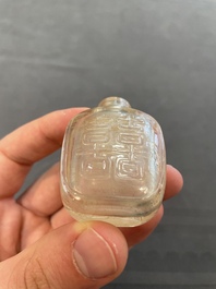 Eleven Chinese snuff bottles in amber, agate, rock crystal, lacquer, hardstone, metal and wood, 19/20th C.