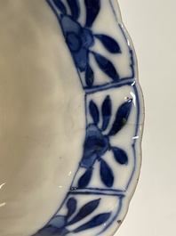 A varied collection of Chinese blue and white, grisaille and famille verte porcelain, Kangxi and later