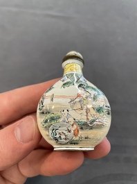 Eleven Chinese snuff bottles in amber, agate, rock crystal, lacquer, hardstone, metal and wood, 19/20th C.