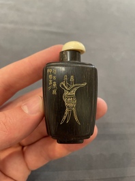 Eleven Chinese snuff bottles in amber, agate, rock crystal, lacquer, hardstone, metal and wood, 19/20th C.