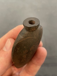 Eleven Chinese snuff bottles in amber, agate, rock crystal, lacquer, hardstone, metal and wood, 19/20th C.