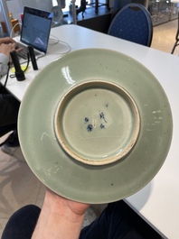 A Chinese blue and white dish, a plate and three famille rose plates, Qianlong and later
