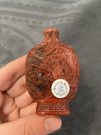 Eleven Chinese snuff bottles in amber, agate, rock crystal, lacquer, hardstone, metal and wood, 19/20th C.