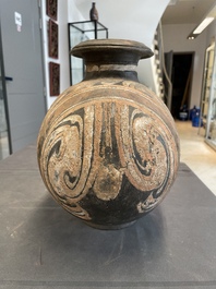 Two Chinese terracotta sculptures and a painted cocoon vase, Han