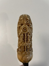 A collection of six krises with carved handles, four with scabbard, Indonesia, 19th C.