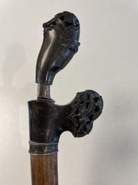 A collection of six krises with carved handles, four with scabbard, Indonesia, 19th C.