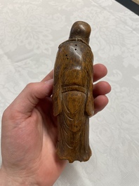 Two Chinese boxwood sculptures of Luohan and Liuhai and a bamboo sculpture of a sage, 17/19th C.