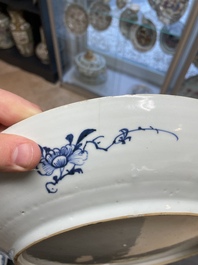 Six Chinese blue and white 'floral' bowls, a pair of dishes, a saucer and an iron-red-decorated plate, Qianlong