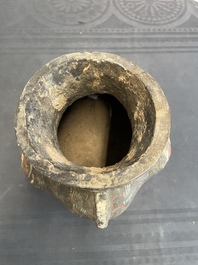 A Chinese painted terracotta owl-shaped 'zun' wine vessel, Han
