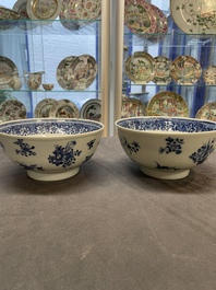 Six Chinese blue and white 'floral' bowls, a pair of dishes, a saucer and an iron-red-decorated plate, Qianlong