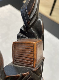 Two Chinese boxwood sculptures of Luohan and Liuhai and a bamboo sculpture of a sage, 17/19th C.