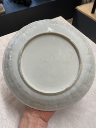 A pair of Chinese iron-red saucers and two plates, Kangxi/Yongzheng