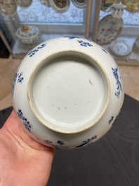 Six Chinese blue and white 'floral' bowls, a pair of dishes, a saucer and an iron-red-decorated plate, Qianlong