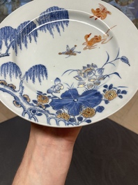 Six Chinese blue and white 'floral' bowls, a pair of dishes, a saucer and an iron-red-decorated plate, Qianlong