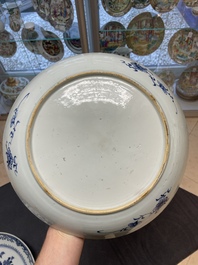 Six Chinese blue and white 'floral' bowls, a pair of dishes, a saucer and an iron-red-decorated plate, Qianlong