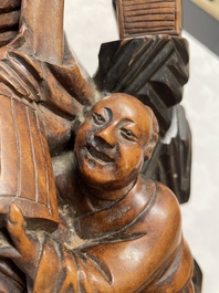 Two Chinese boxwood sculptures of Luohan and Liuhai and a bamboo sculpture of a sage, 17/19th C.